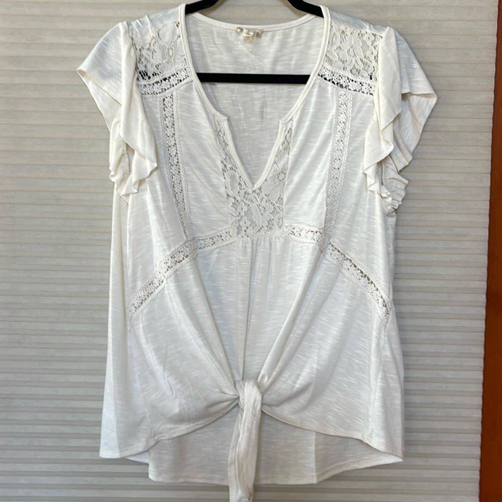 Women’s ivory lace v-neck ruffle sleeve top material is very lightweight size L